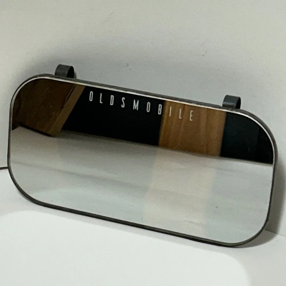 Vintage Oldsmobile Sun Visor Vanity Mirror Metal Backed Automotive Accessory 8x4